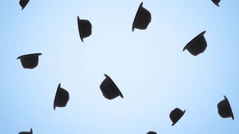 animation of black hats falling on blue background