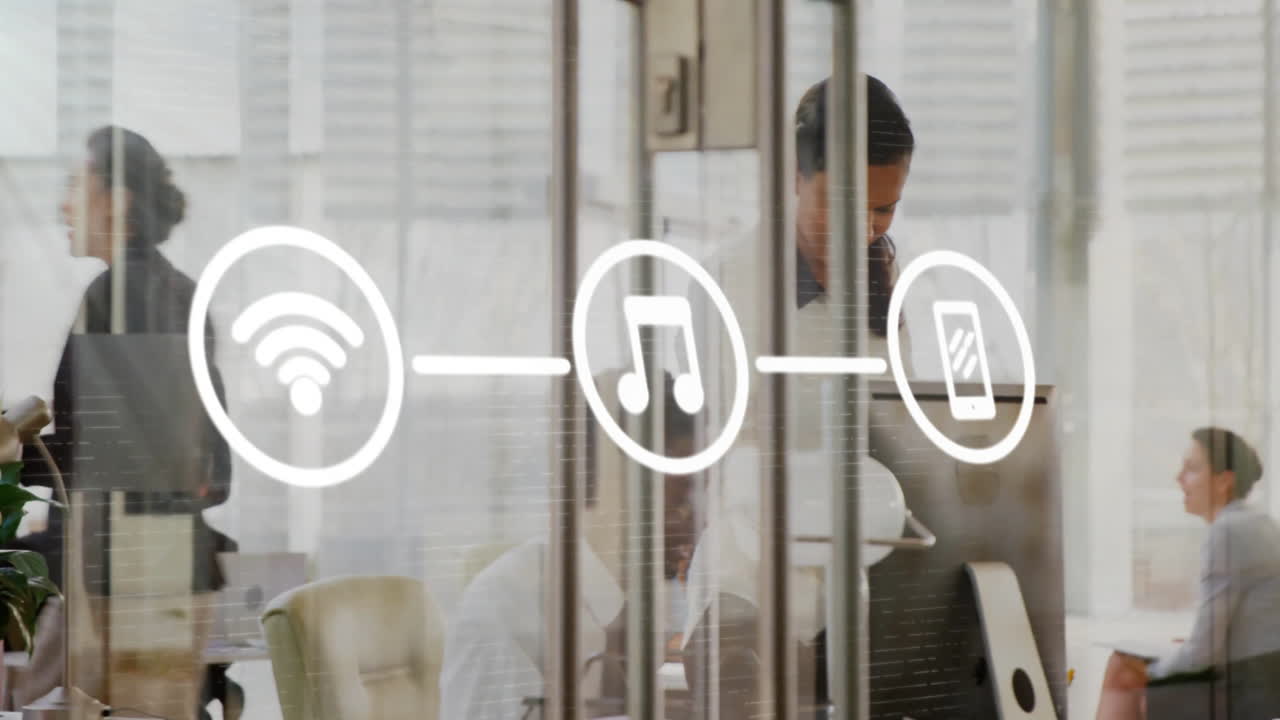 Animation of flowchart of icons over diverse coworkers discussing and working in office