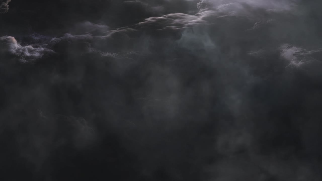Thunderstorm lightning in dark sky over dark clouds