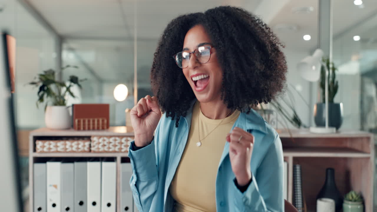 Happy and Successful Businesswoman in Office