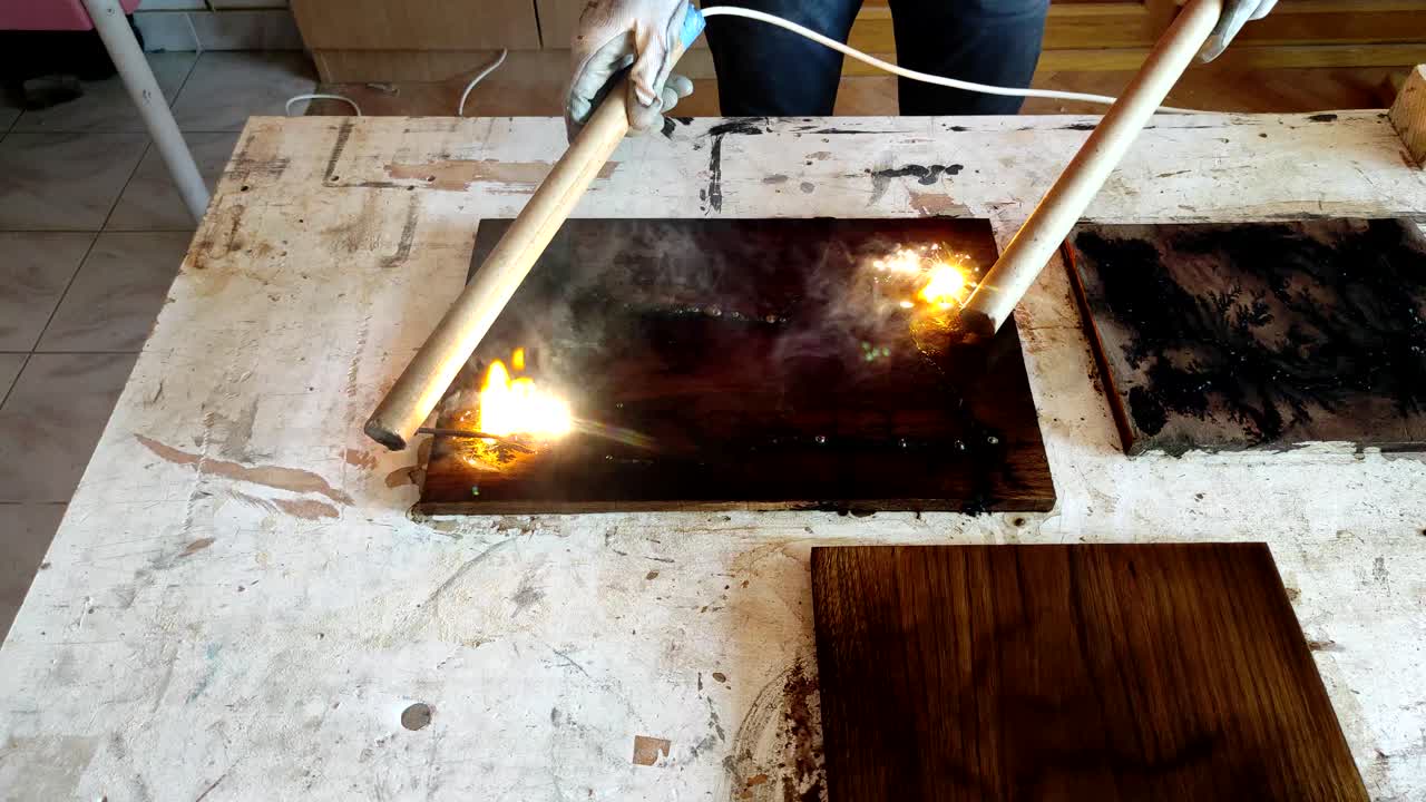 Fractal burning electricity wood in small wood working shop