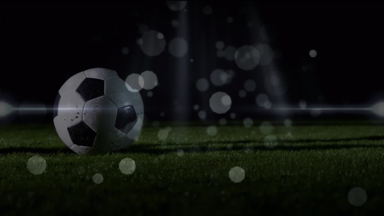 Animation af netværk af forbindelser med ikoner over en fodboldspiller, der sparker til en bold på en bane