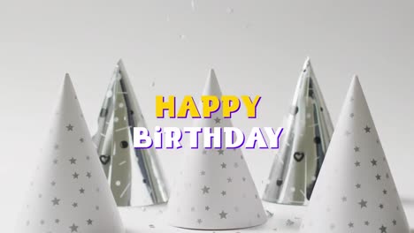 Animation-of-happy-birthday-text-over-party-hats-in-background