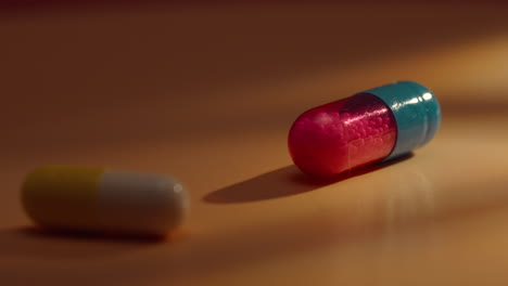 two pills on a surface