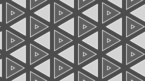 patrón gráfico en blanco y negro con efecto estroboscópico e hipnótico, mientras aumenta en tamaño y luego lo reduce.