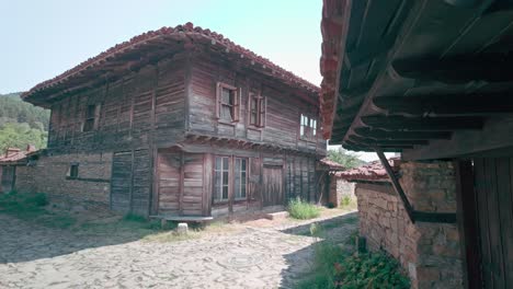 peaceful cobbled street of balkan traditional wooden house village