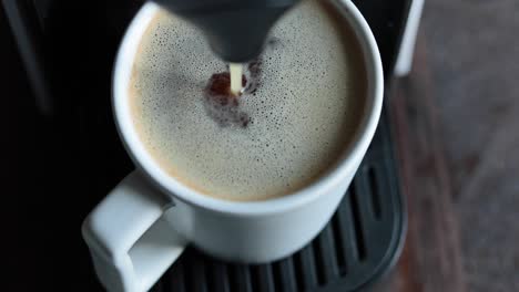 coffee beans in coffee mug