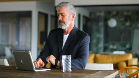businessman using laptop on table 4k
