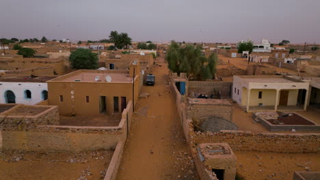 streets in chinguetti, mauritania at sunrise - drone shot