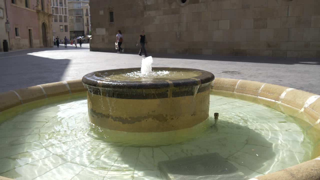 Historic City Street with Fountain and Church