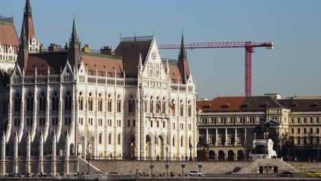budapest city center view with parliament building and danube river on a sunny day, gothic architecture, medium distant shot