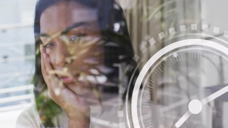 animation of moving clock and shapes over biracial woman