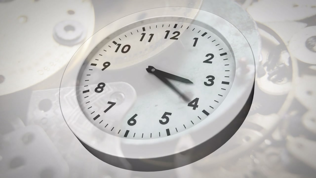 Animation of clock moving over clock mechanism