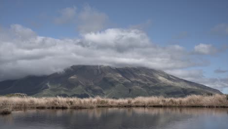 mountain landscape with clouds and water