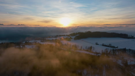 scenic view of golden sunset over winter landscape near the town of lutry in canton of vaud, switzerland