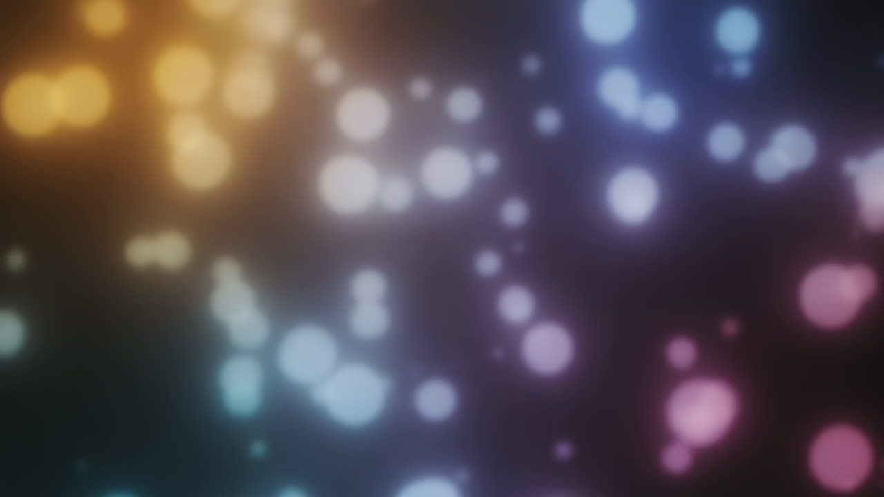 Particelle bokeh colorate che fluttuano e si spostano su sfondo scuro