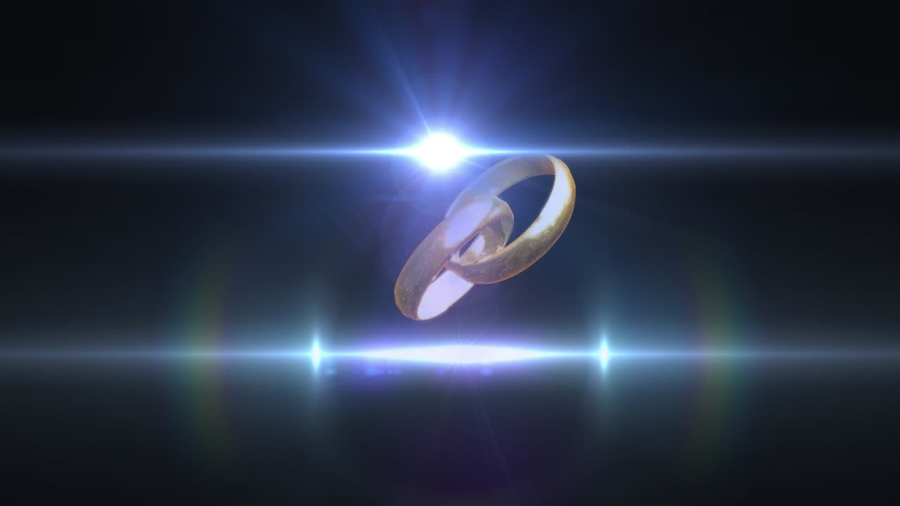 Animation of two interlocked gold wedding rings and white beams on light on black background
