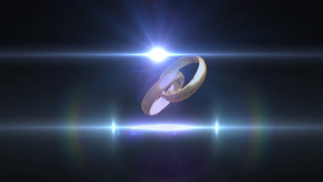 animación de dos anillos de bodas de oro entrelazados y vigas blancas en luz sobre fondo negro