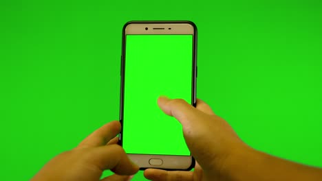 green screen tablet and green background chromakey commercial device using footage