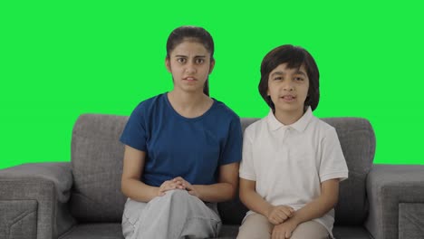 Frustrated-Indian-siblings-fighting-to-the-camera-Green-screen