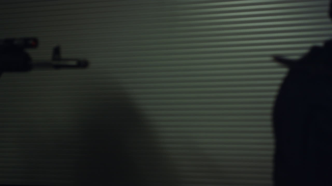 Special forces group exploring construction building for terrorists at night