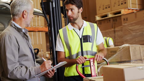 warehouse workers working together