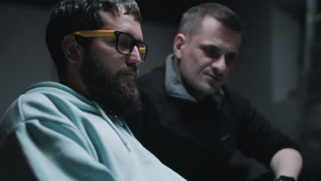 two men in conversation
