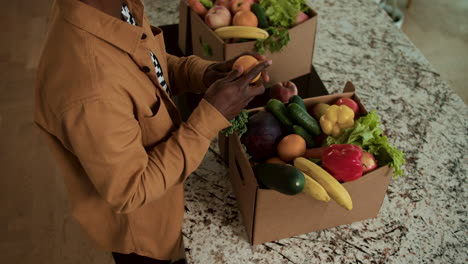 man unpacking groceries