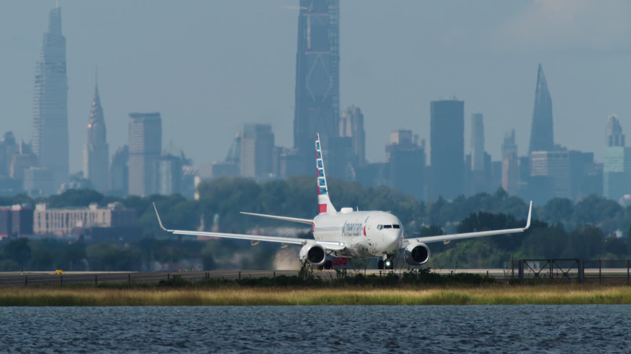 JFK Airport Runway in NYC with American Airlines Plane Ready for Take-off