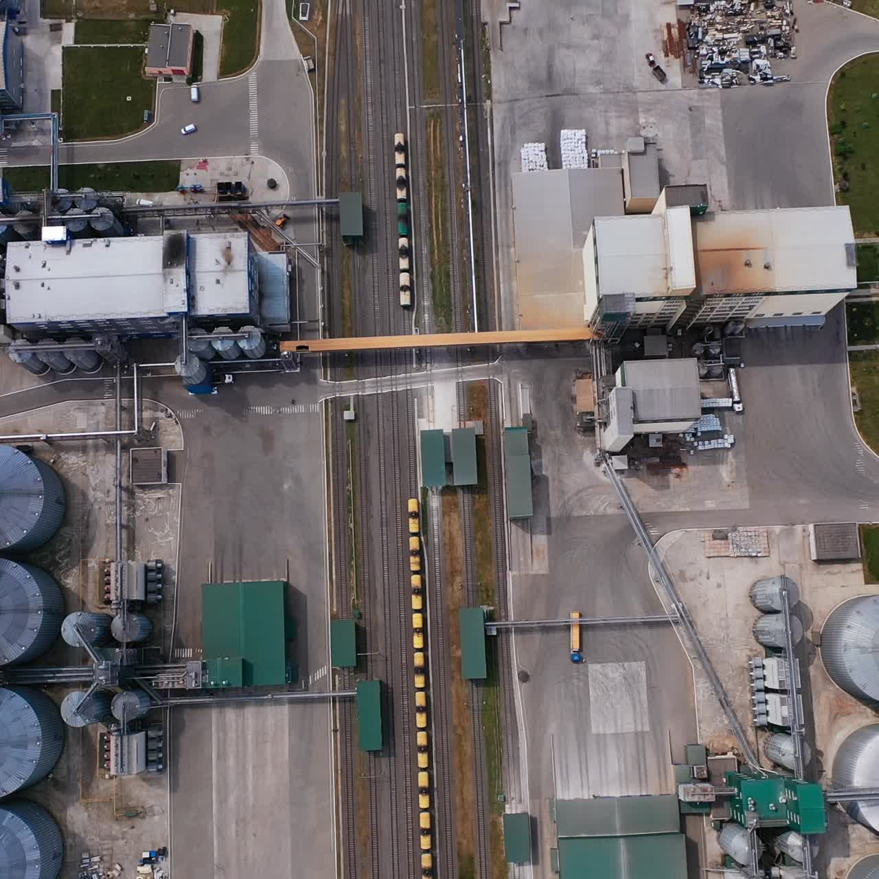 Grain big storages aerial view. Large metal hangar for granary