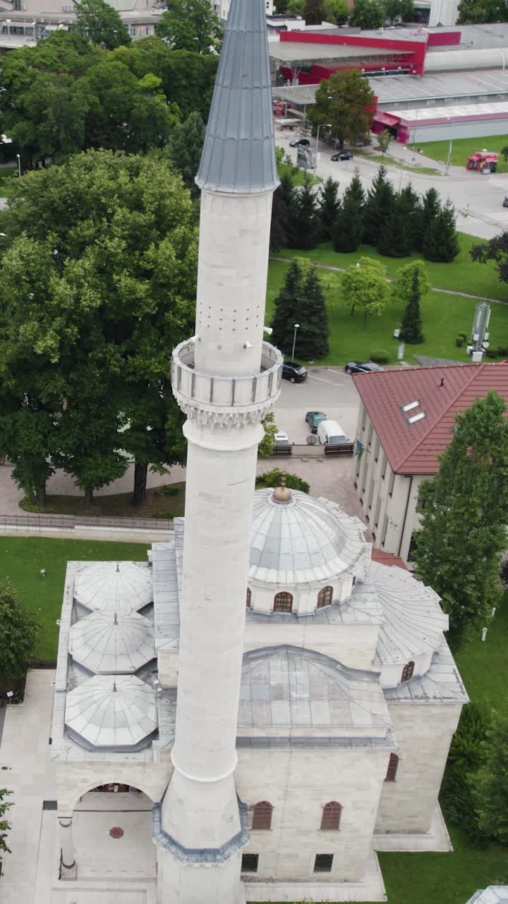 Historic architecture of the Ferhadija Mosque captured from an elevated perspective. Aerial, Vertical Video