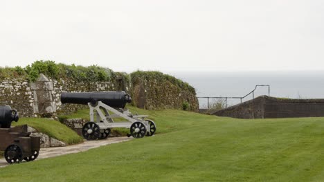 gun placement at an old military sea defence with sea in background