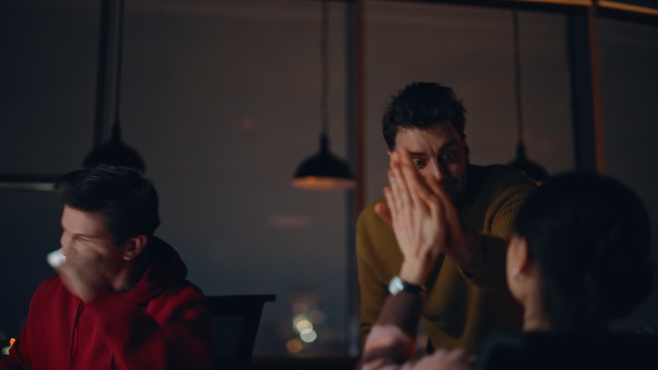 Friends Celebrating Success with High Fives