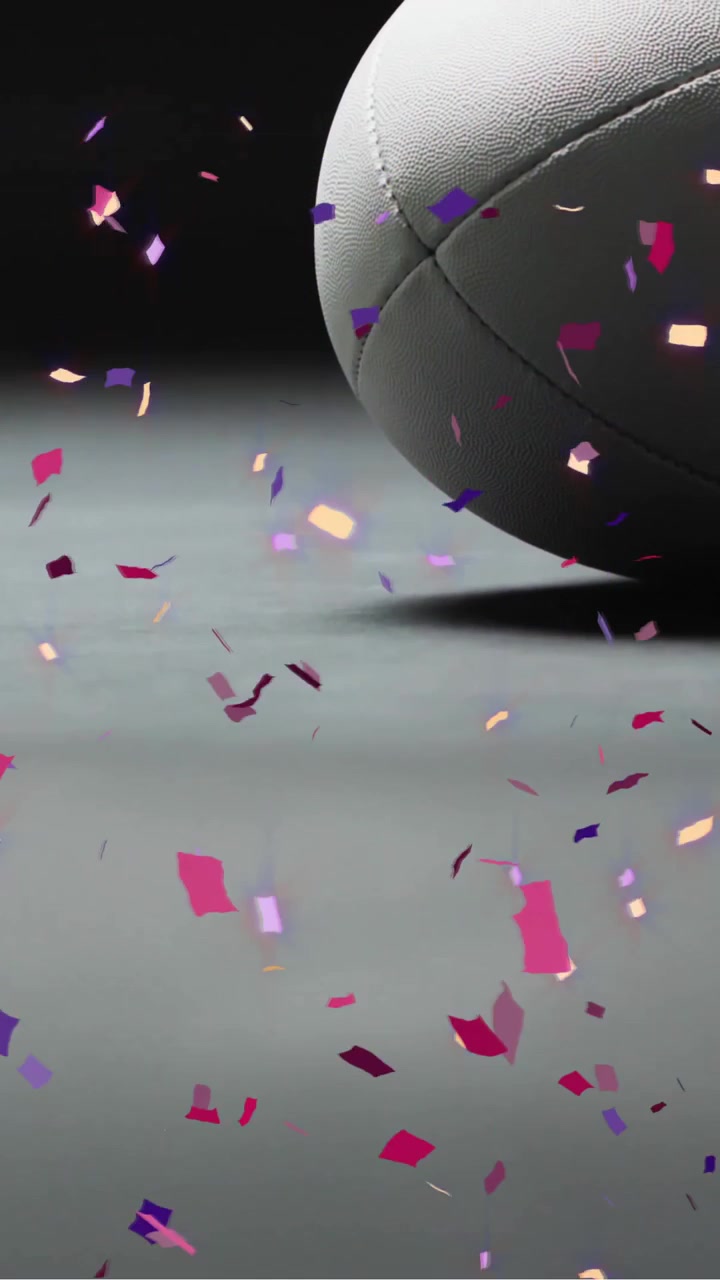 Animazione di coriandoli su una palla da rugby bianca su sfondo nero
