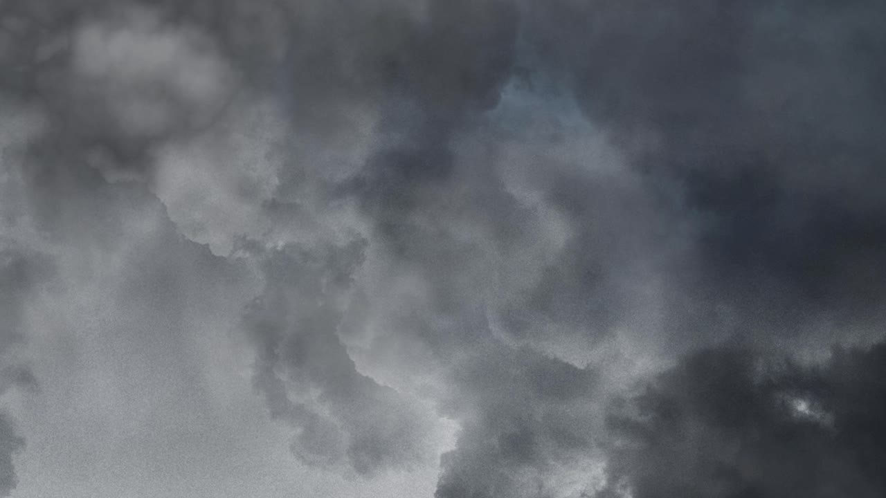 Strong thunder storm in black clouds 4k