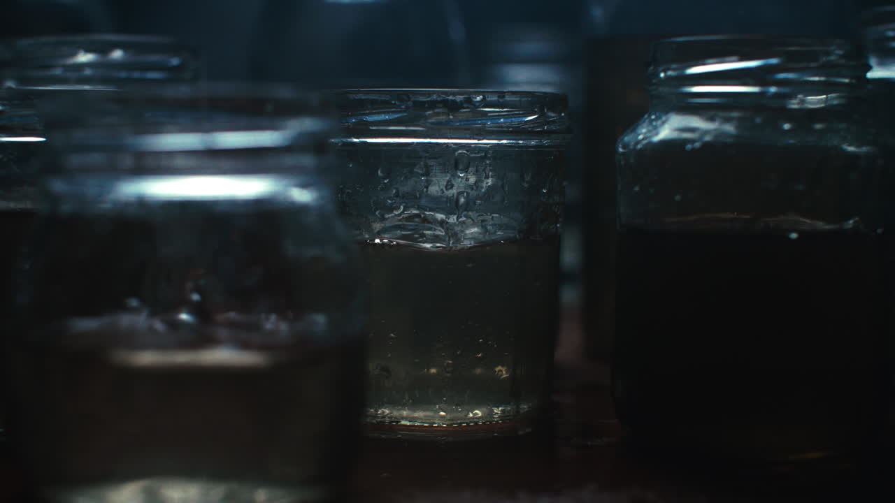 Water driping on glass jars