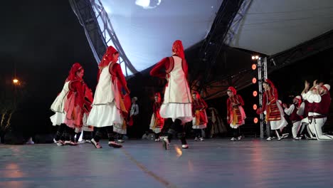 folk dance of kosovo women dressed in beautiful red and white traditional clothes
