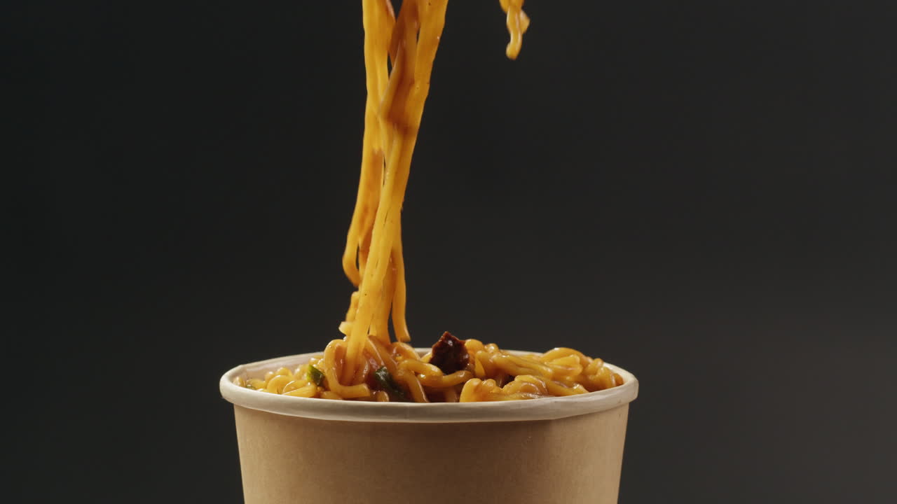 Eating Instant Ramen Noodles