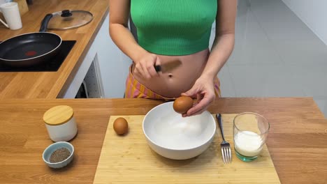 preparing eggs for breakfast