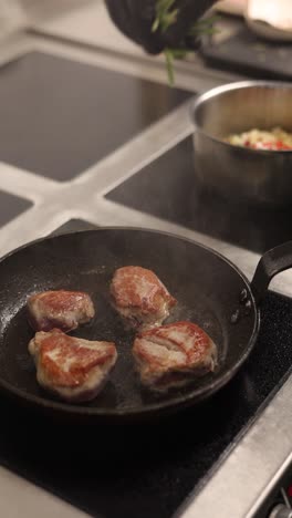 chef cooking lamb chops