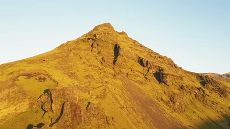 an aerial of a mountain during sunrise in iceland