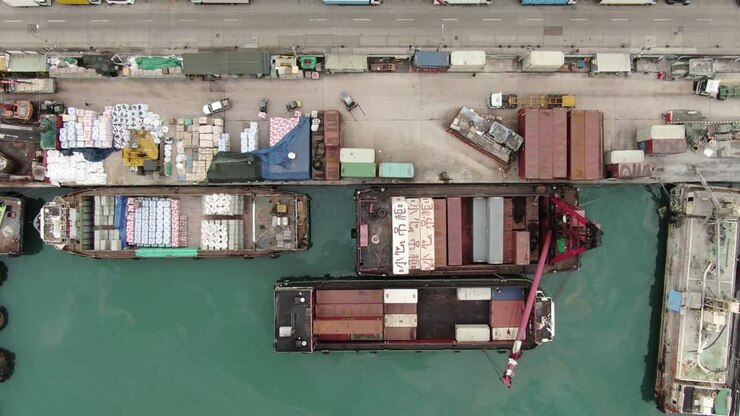 Small feeder type Container barges operating in Hong Kong pillar point dock