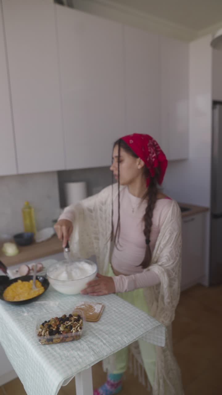 Young Woman Baking in Kitchen