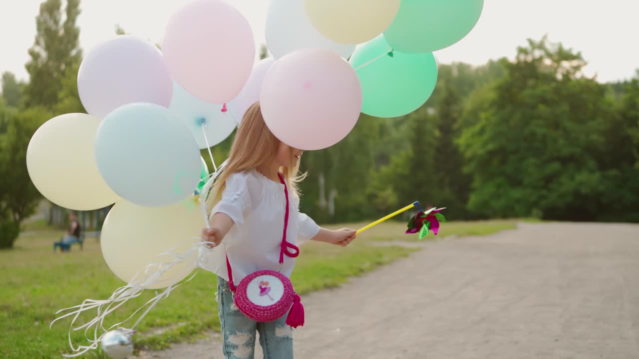 Happy Child Running In Park. Excited little girl running in green park
