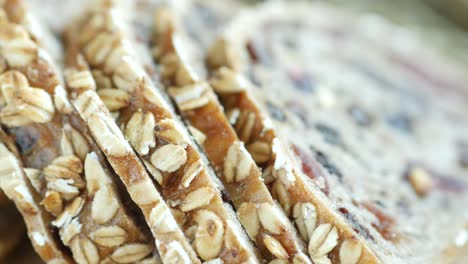 close-up of sliced oatmeal fruit bread