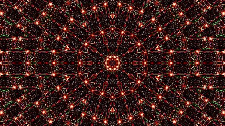 Bellissimo caleidoscopio astratto che brilla, una luce radiosa che regola i movimenti sottili