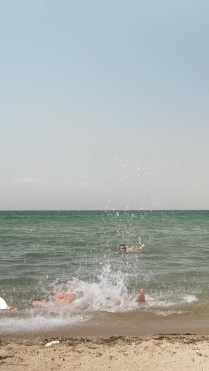 Man playing frisbee on the beach