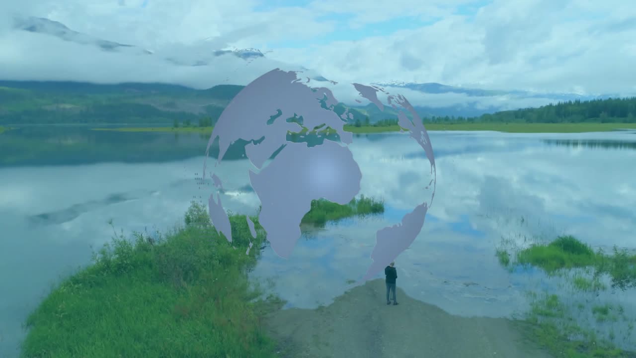 Woman standing on shore, globe appearing hovering above her, rotating showing continents for tech