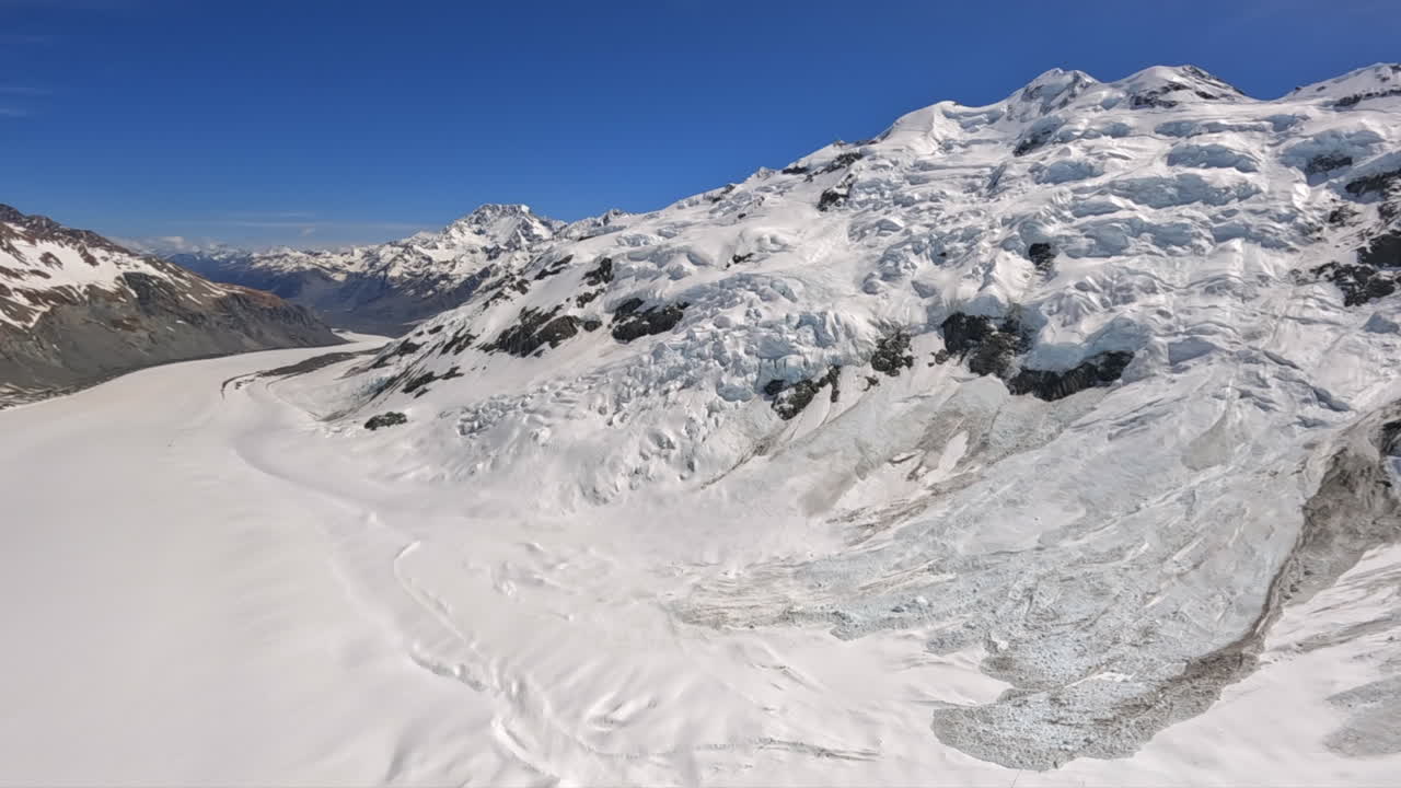 Flying down the Tasman Glacier in the Southern Alps, New Zealand