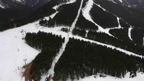 Aerial-views-of-ski-stations,-different-landscapes-and-viewers-in-Andorra-during-the-covid-times